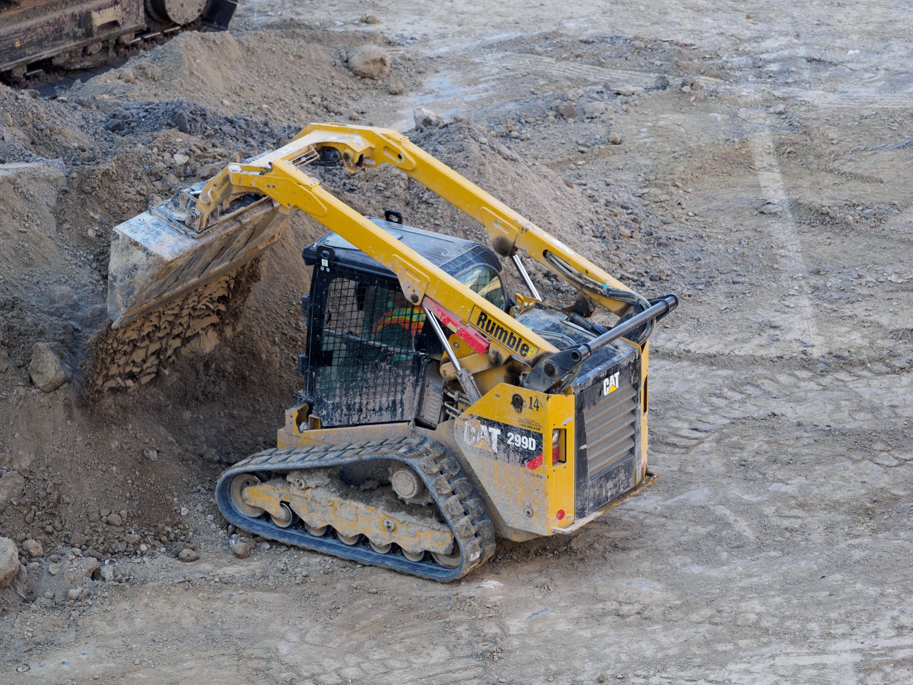 Bulldozer moving earth on an excavation site