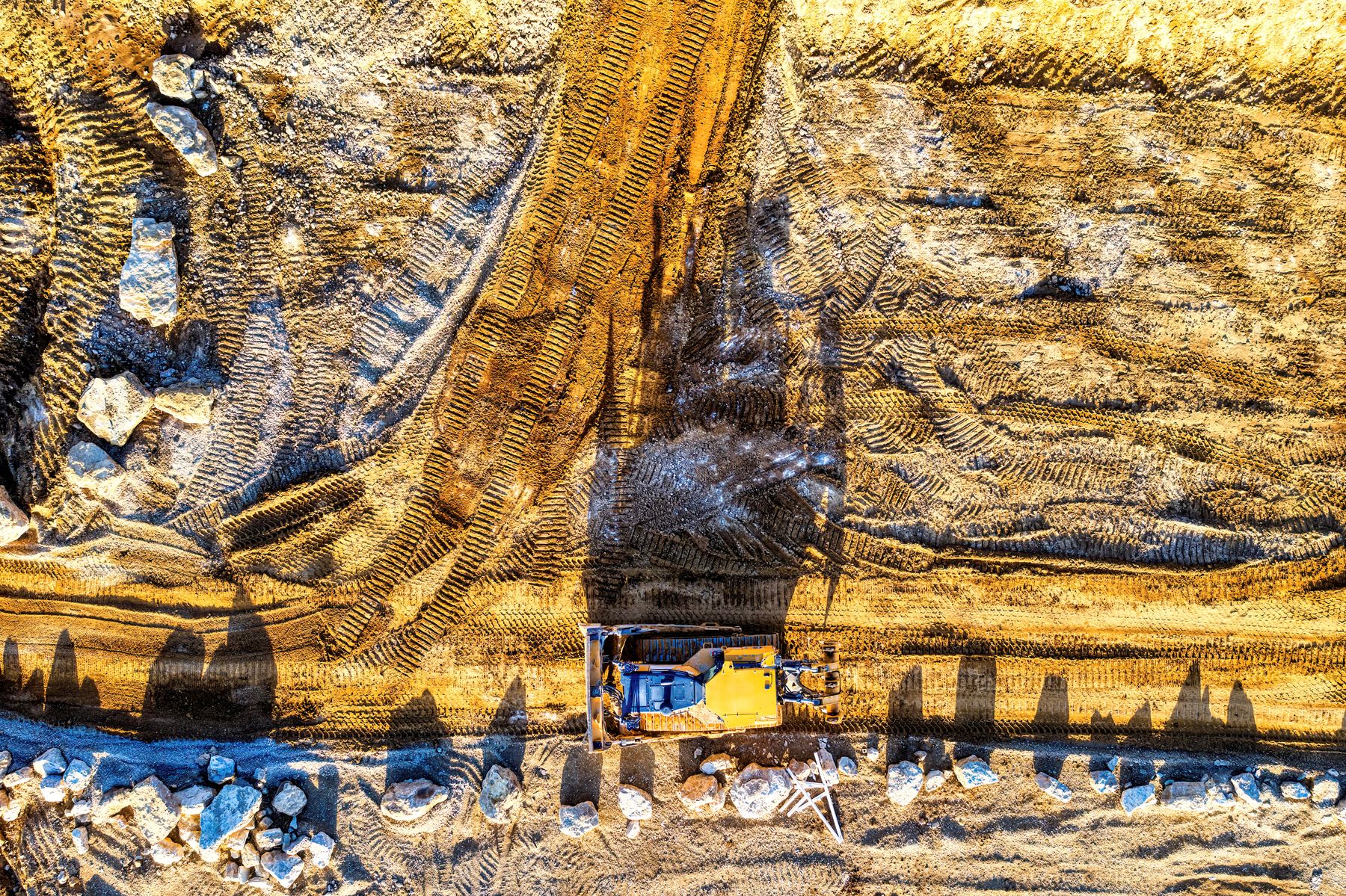 Aerial view of excavation and dirt roads